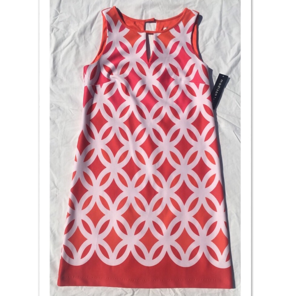 Knee length orange, pink, and white shift dress